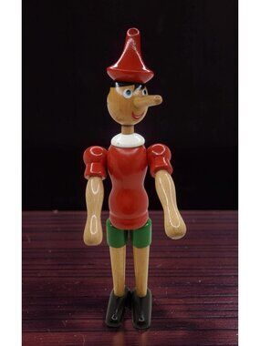 vintage 1970s pinocchio wooden articulated 12"h doll figurine.